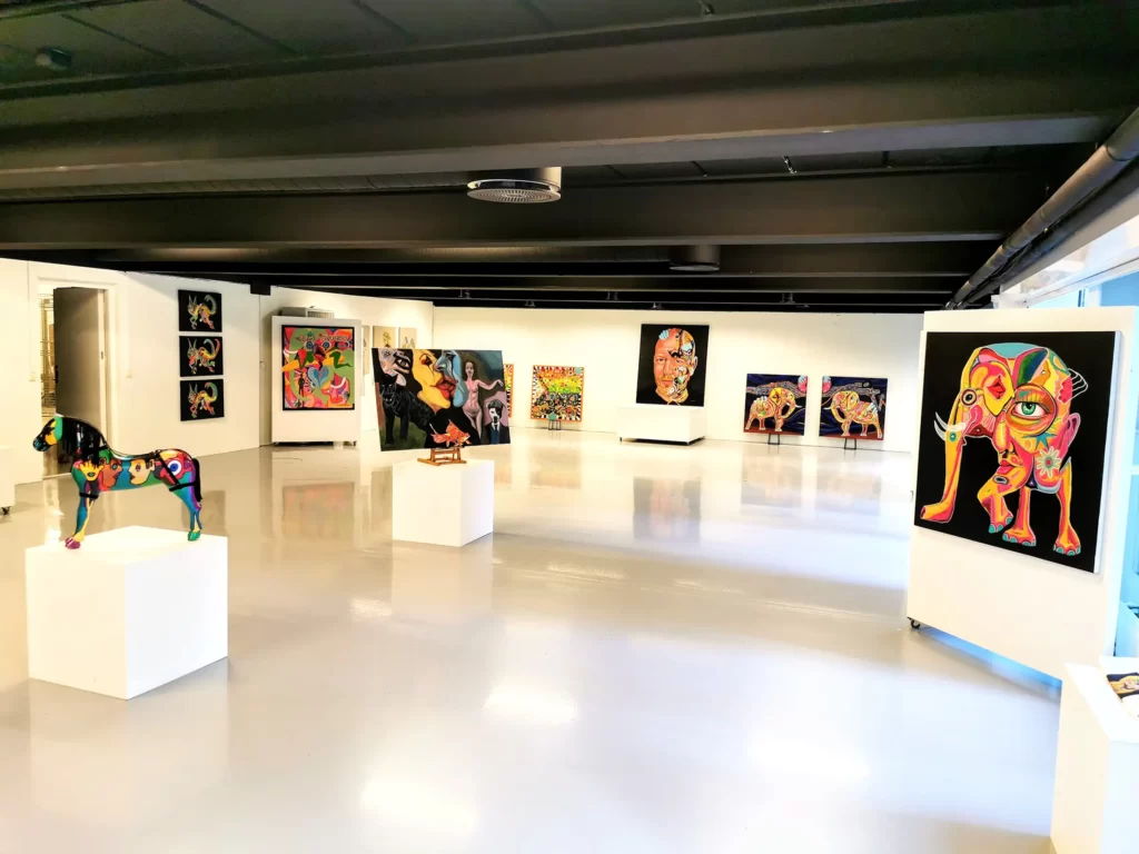 Paintings hanging on wall in a gallery
